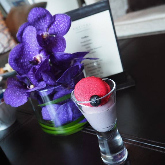 Afternoon delight with a French twist and a Thai flower arrangement at the Club Millesime lounge.