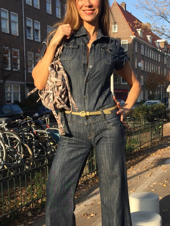 Beertje van Beers wearing a denim jumpsuit, with a FAB belt